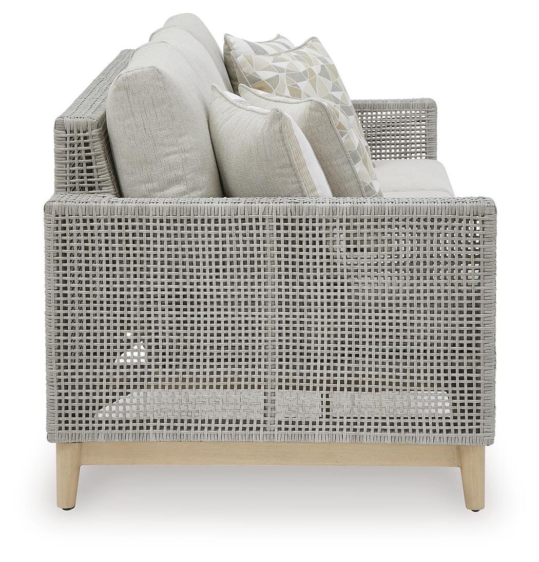 Seton Creek Outdoor Sofa with Cushion in Gray, side view