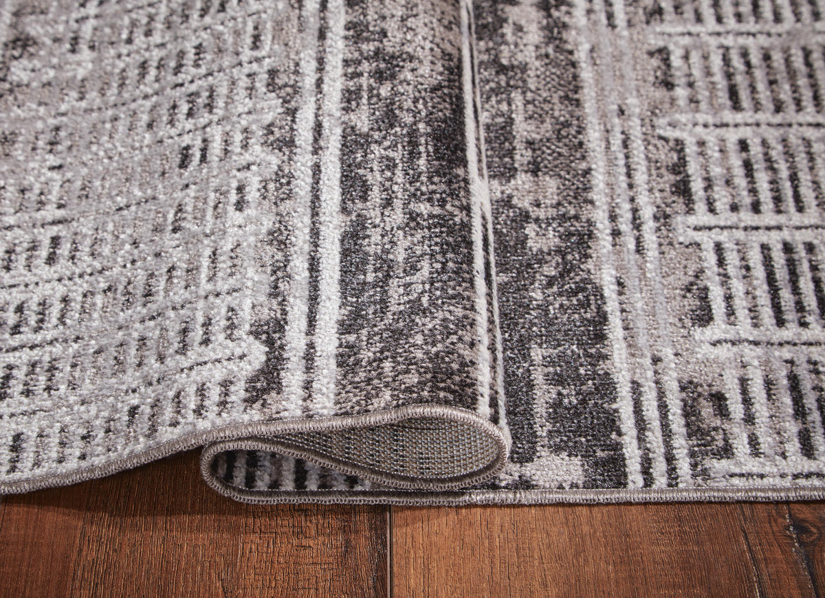 Henchester 5' x 7' Washable Rug in Multi, detail view