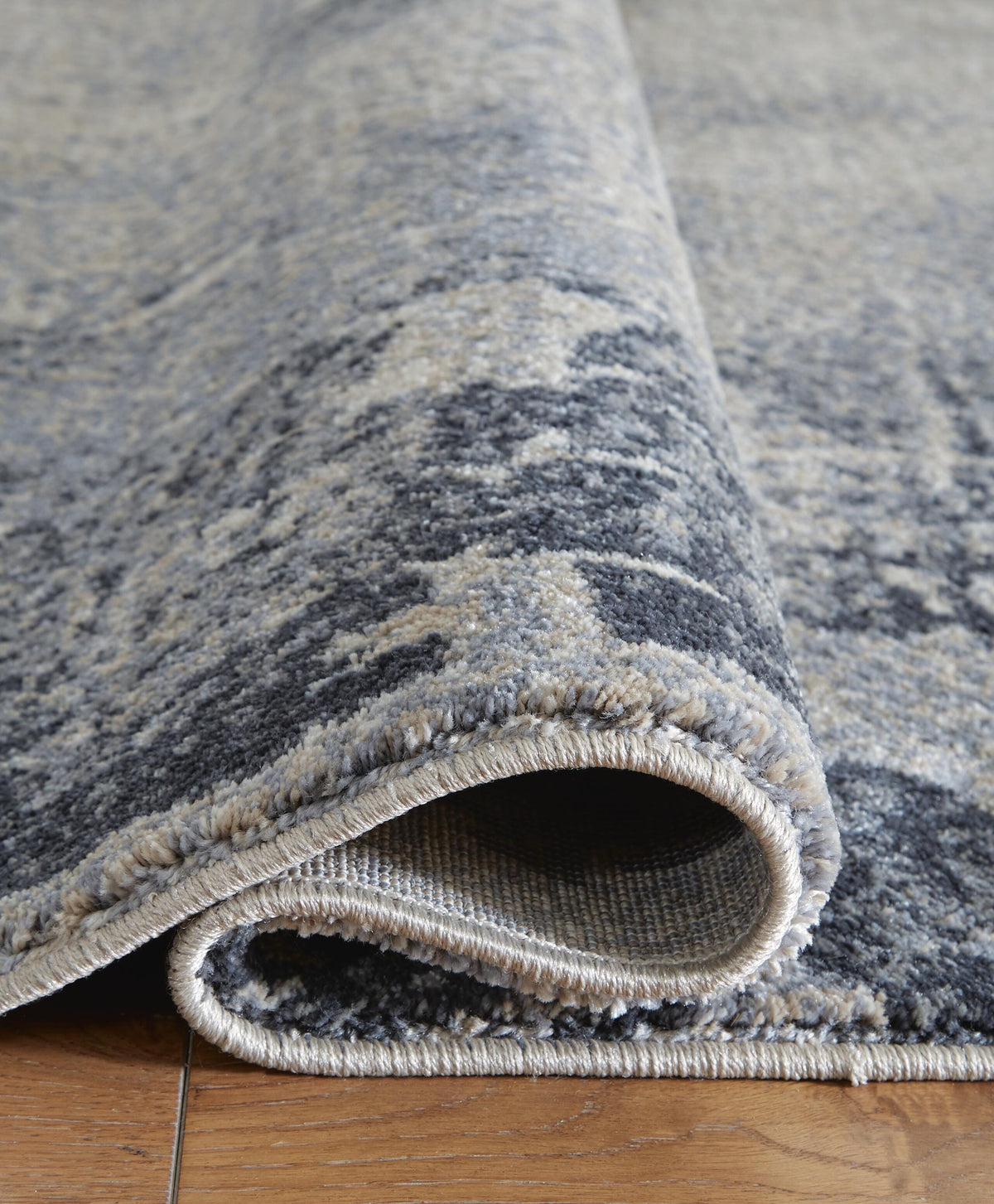 Langrich 5'3" x 7'3" Rug in Blue/Gray/Cream, detail view