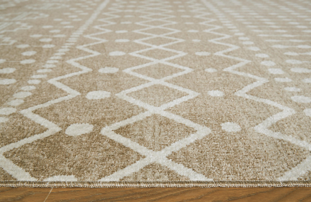 Bunchly 4'11" x 7'2" Washable Rug in Tan/Brown/Cream, detail view