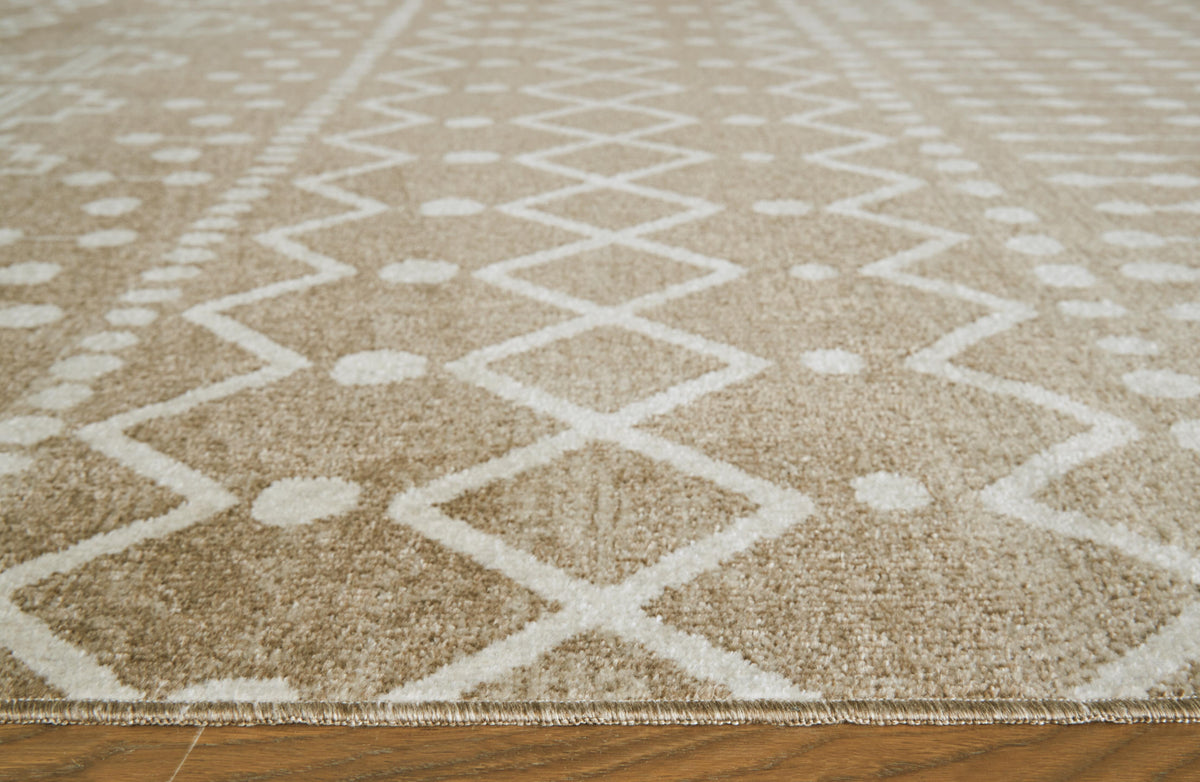 Bunchly 4'11" x 7'2" Washable Rug in Tan/Brown/Cream, detail view