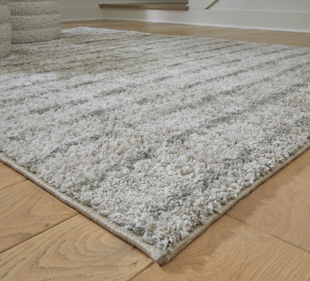 Laddway 5' x 7' Rug in Cream/Green, detail view