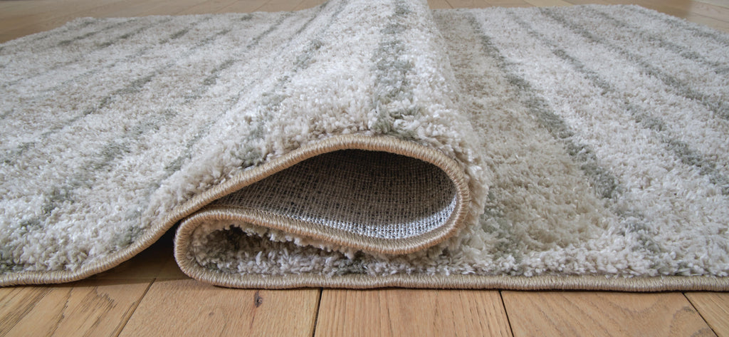 Laddway 5' x 7' Rug in Cream/Green, detail view