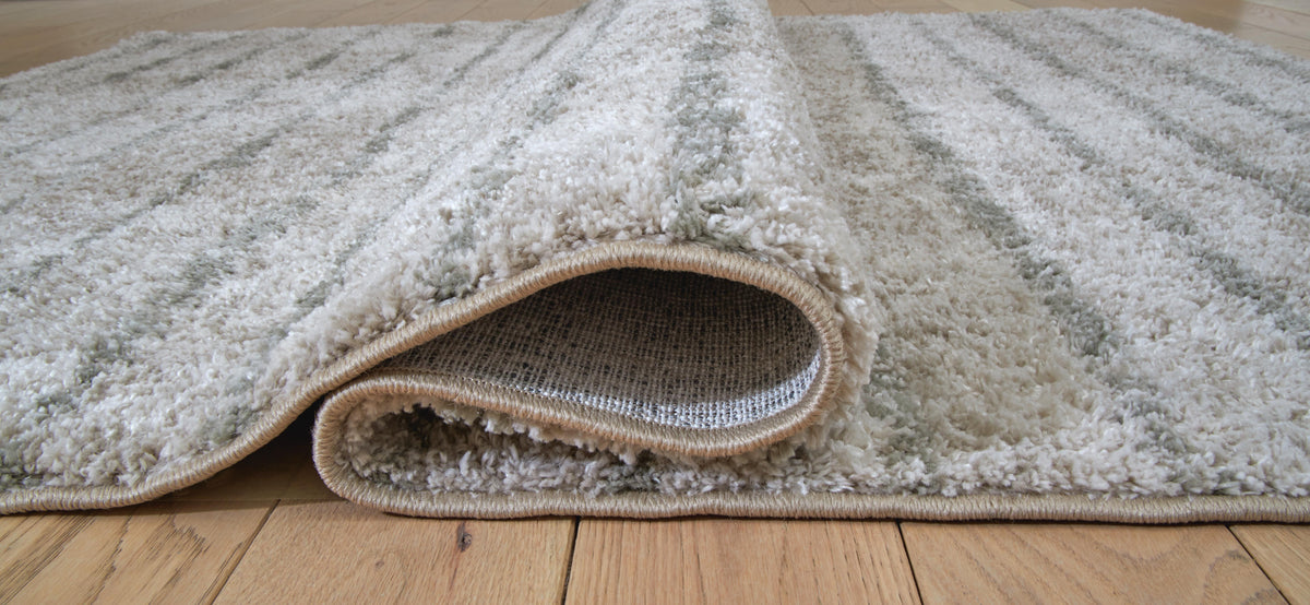 Laddway 5' x 7' Rug in Cream/Green, detail view