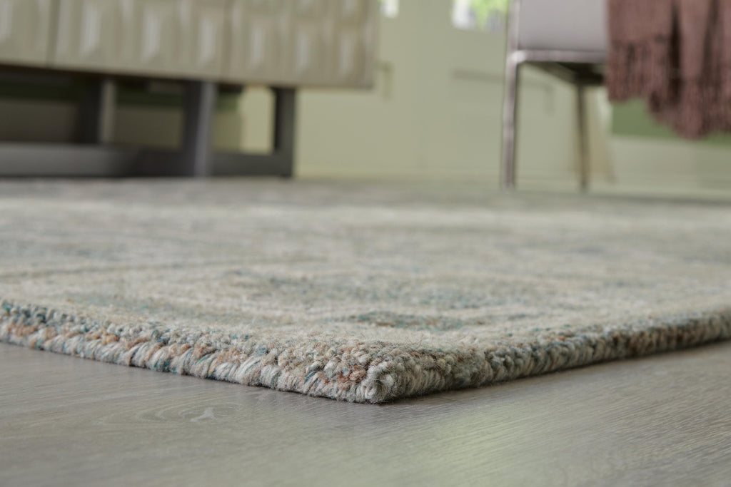 Jossland 5' x 7' Rug in Green/Ivory, detail view