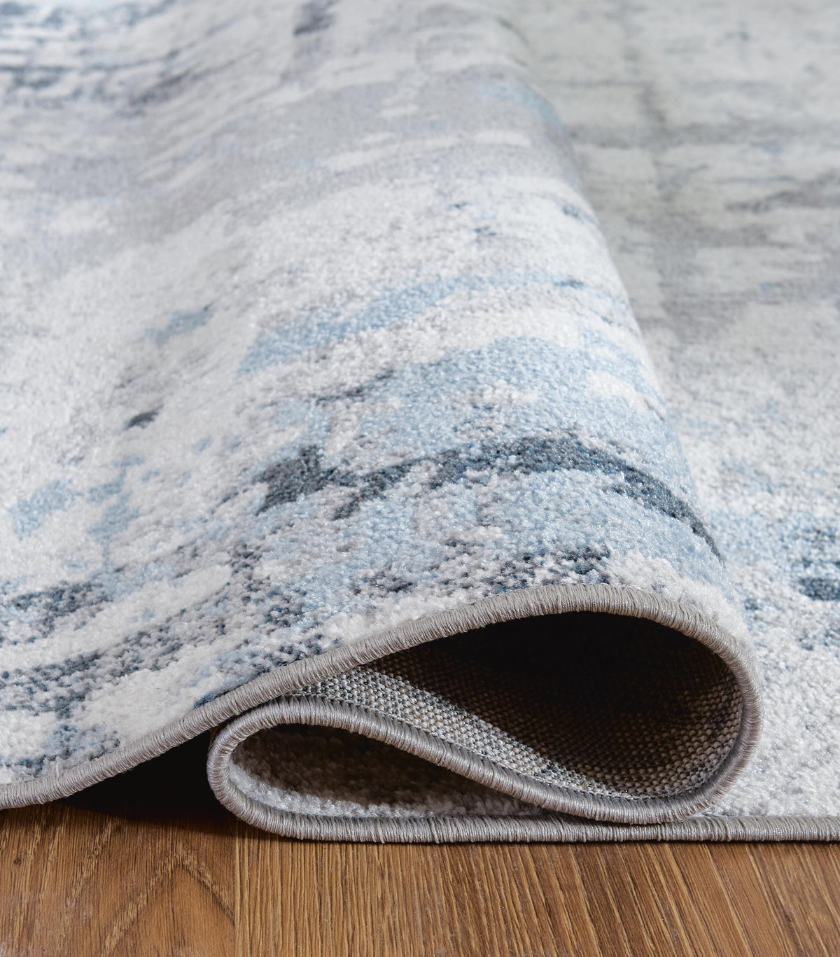 Emertonly 8' x 10' Washable Rug in Blue/White/Gray, detail view