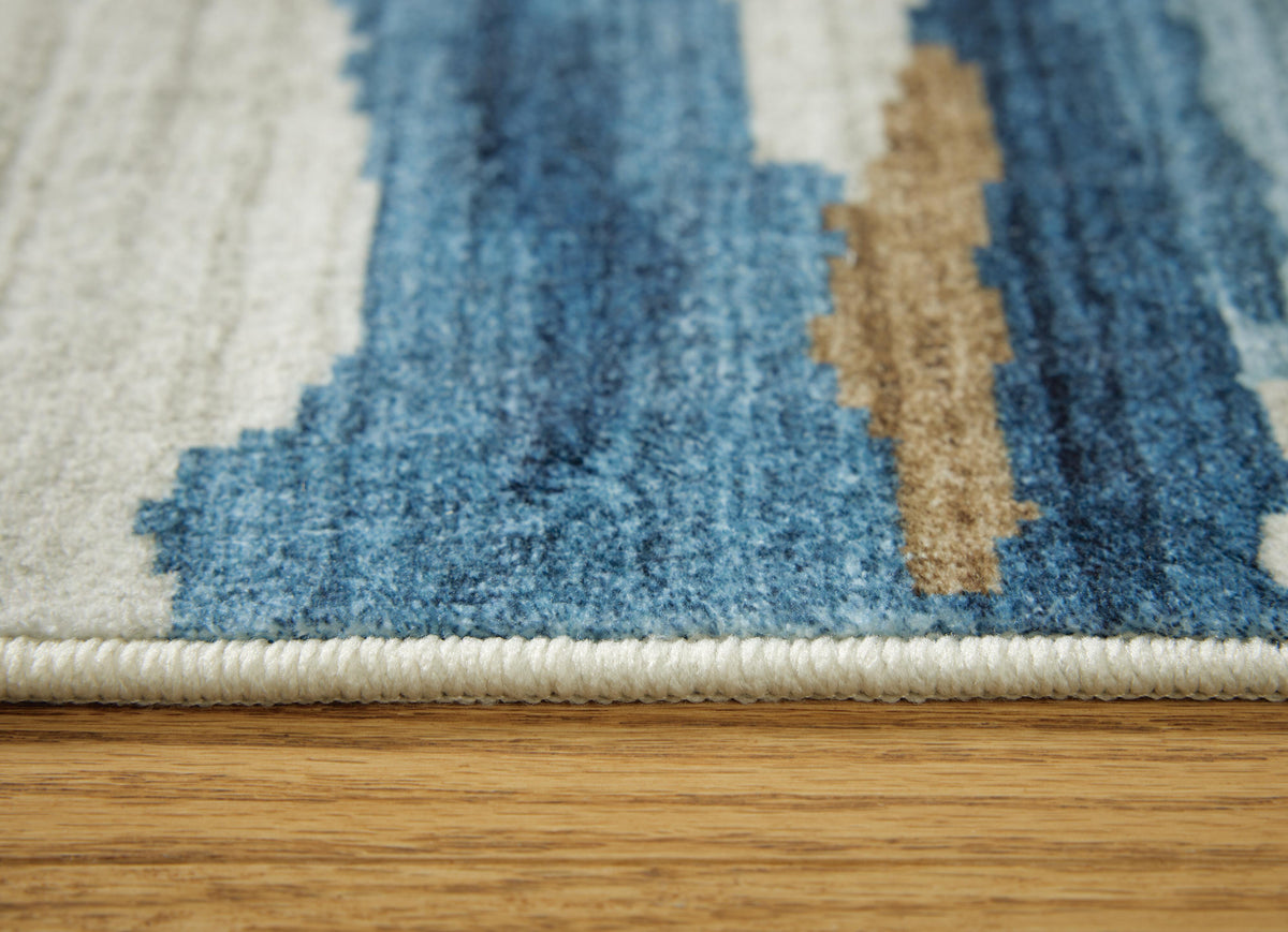 Vinlett 5' x 7' Washable Rug in Cream/Blue/Brown, detail view