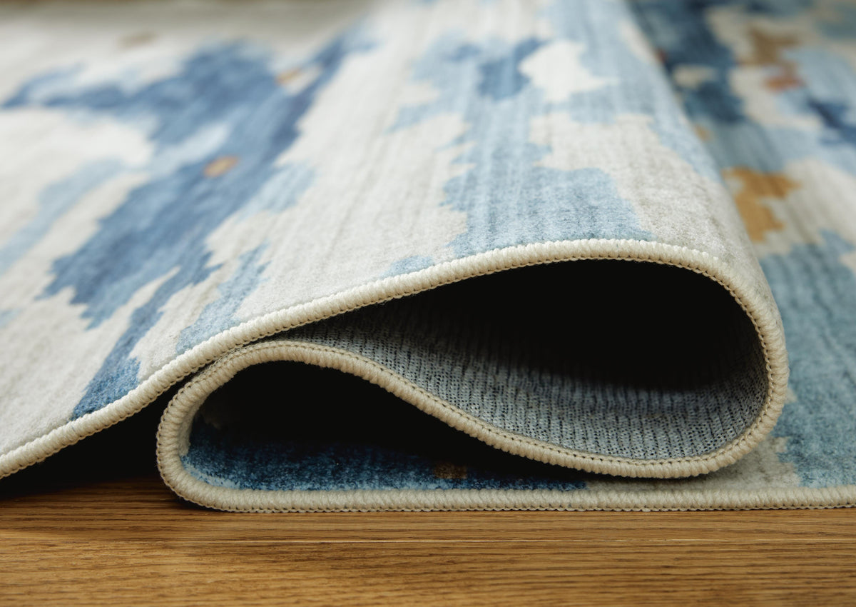 Vinlett 8' x 10' Washable Rug in Cream/Blue/Brown, detail view