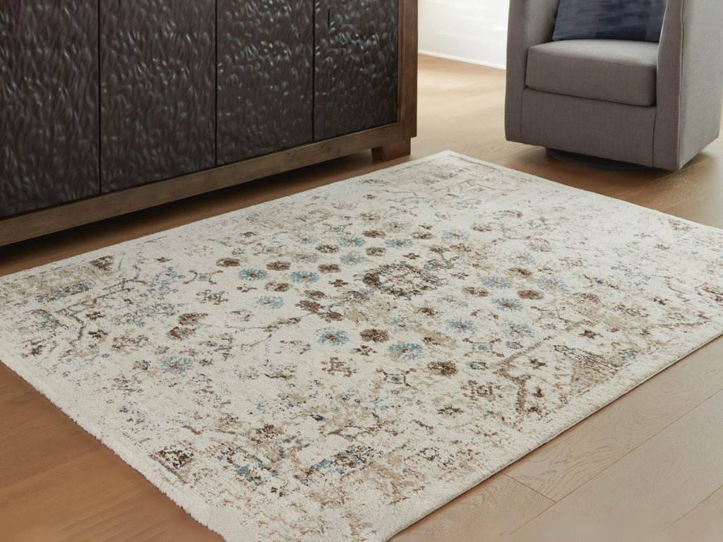 Jossler 5' x 7' Rug in Ivory/Brown/Teal, lifestyle view