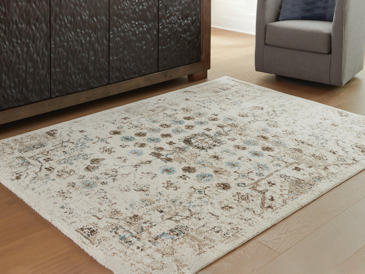 Jossler 5' x 7' Rug in Ivory/Brown/Teal, lifestyle view