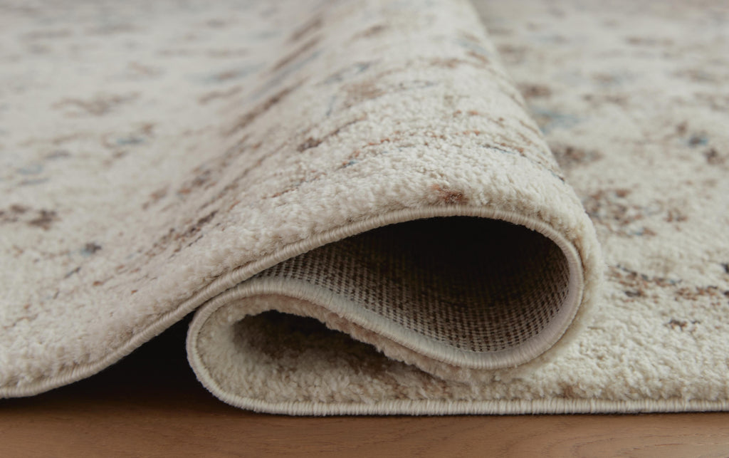 Jossler 8' x 10' Rug in Ivory/Brown/Teal, detail view