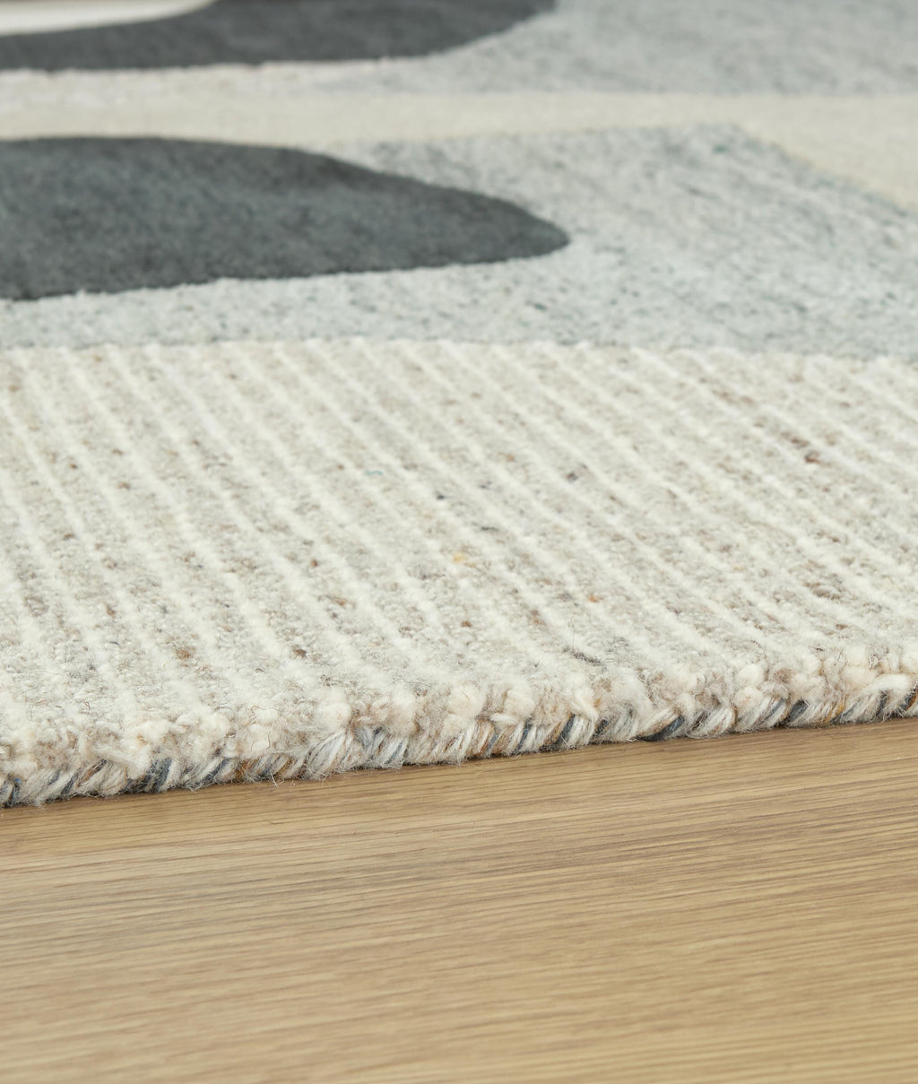 Edrickhill 5' x 7' Rug in Grayish Teal/Taupe/Cream, detail view
