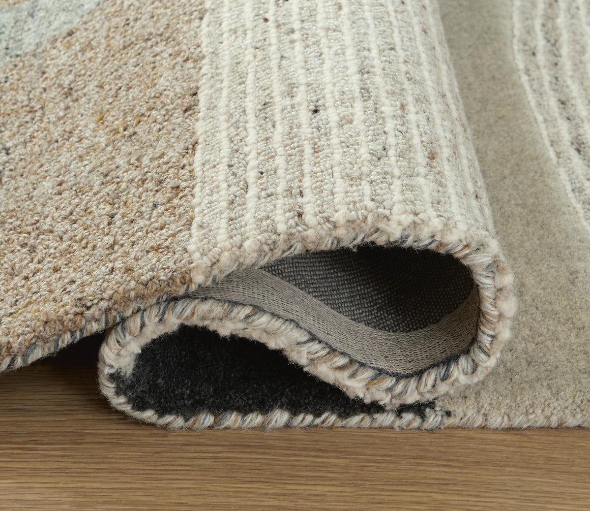 Edrickhill 5' x 7' Rug in Grayish Teal/Taupe/Cream, detail view