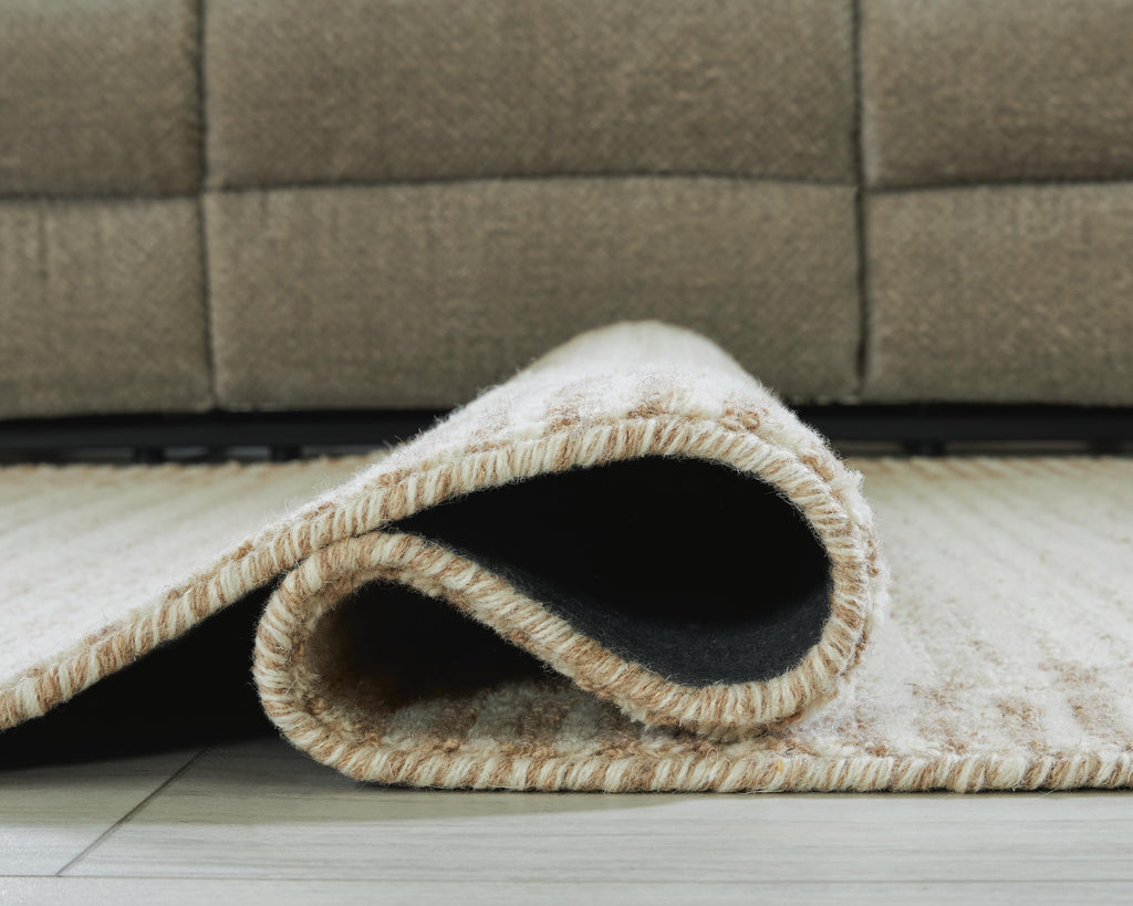 Emorymore Medium Rug in Brown/Beige, detail view