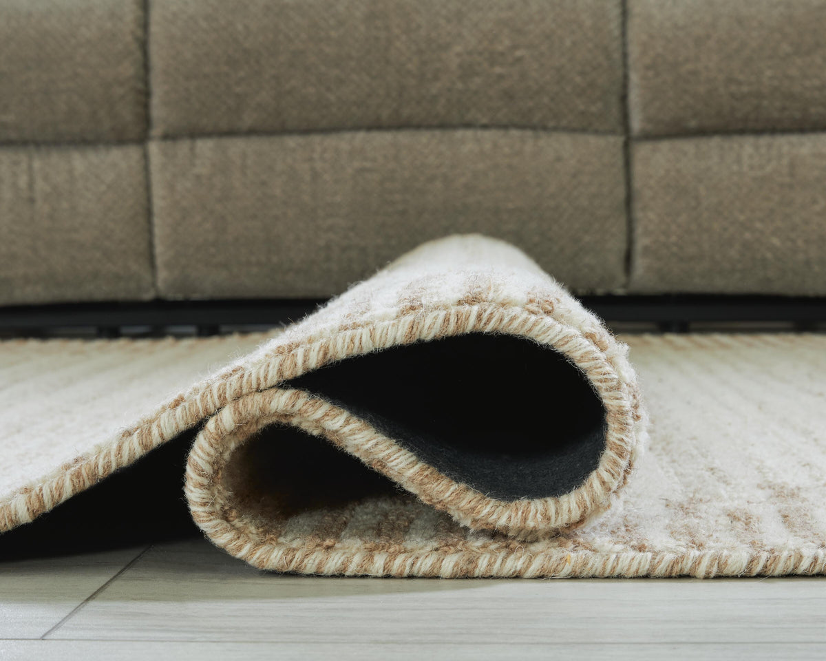 Emorymore Medium Rug in Brown/Beige, detail view