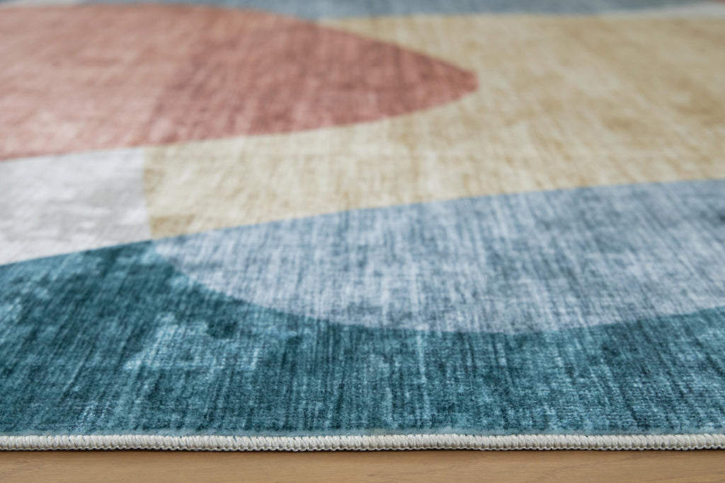 Chanleigh Washable 5' x 7' Area Rug in Multi, detail view