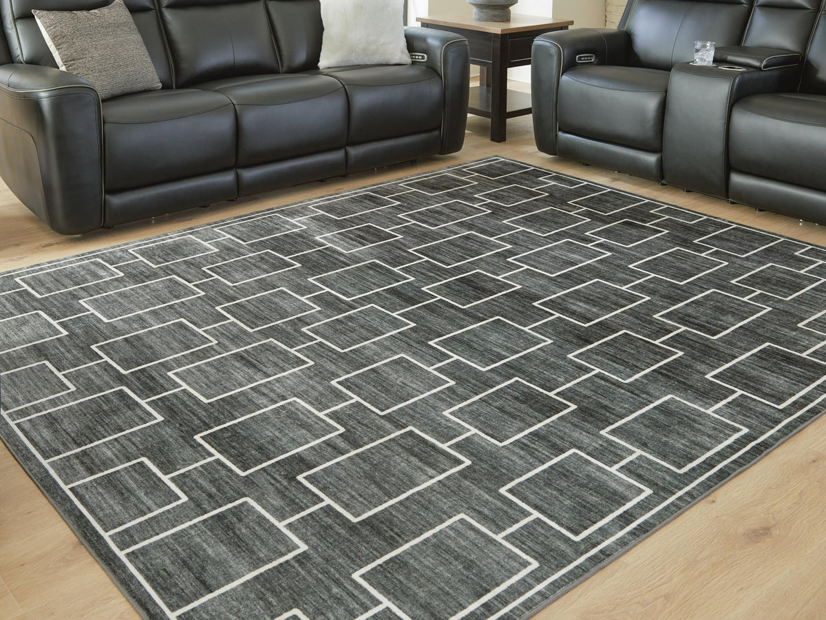 Elderland Washable 7'6" x 9'6" Area Rug in Black/Gray, lifestyle view