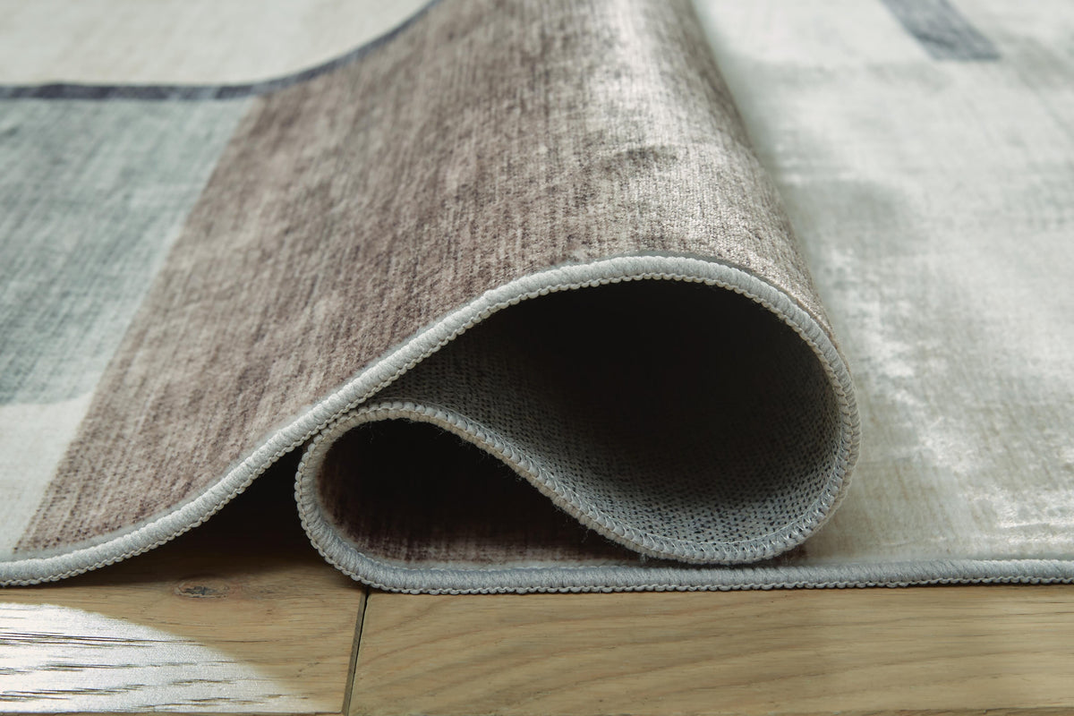 Larkport Washable 5' x 7' Area Rug in Cream/Brown/Gray, detail view
