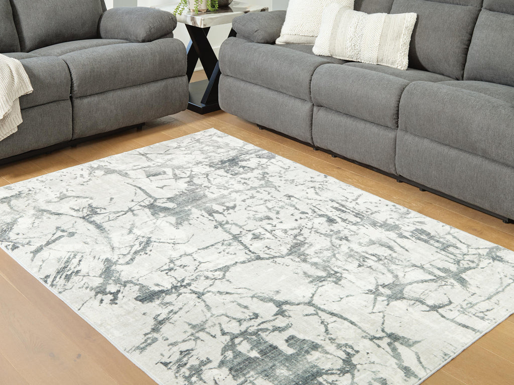 Tobinbury Washable 5' x 7' Area Rug in Gray, lifestyle view