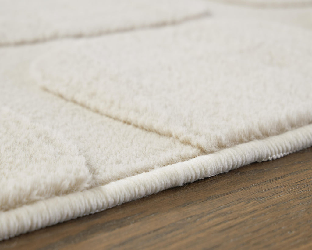 Malvinsboro Washable 5' x 7' Area Rug in Sandstone, detail view