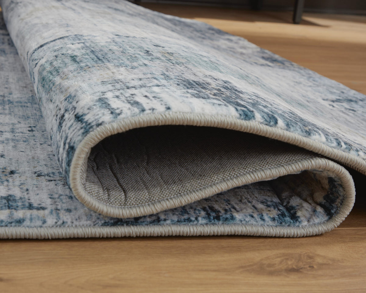 Arlenmont 5' x 7' Memory Foam Area Rug in Blue/White/Brown, detail view