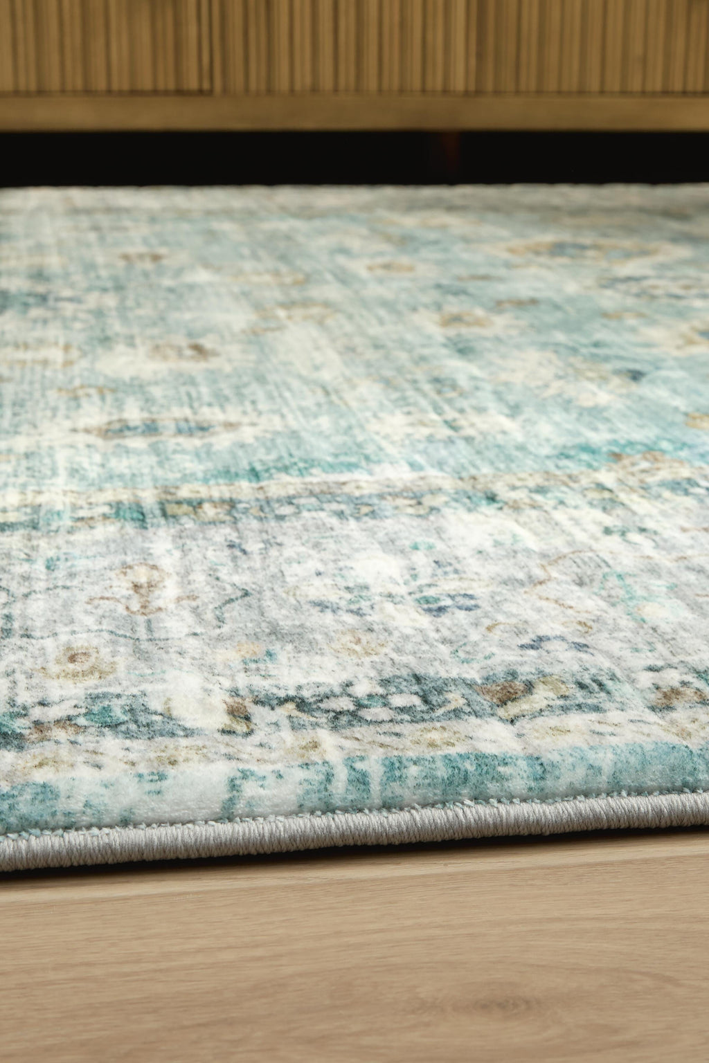 Ladstoney 5' x 7' Memory Foam Area Rug in Teal/Beige/Ochre, detail view
