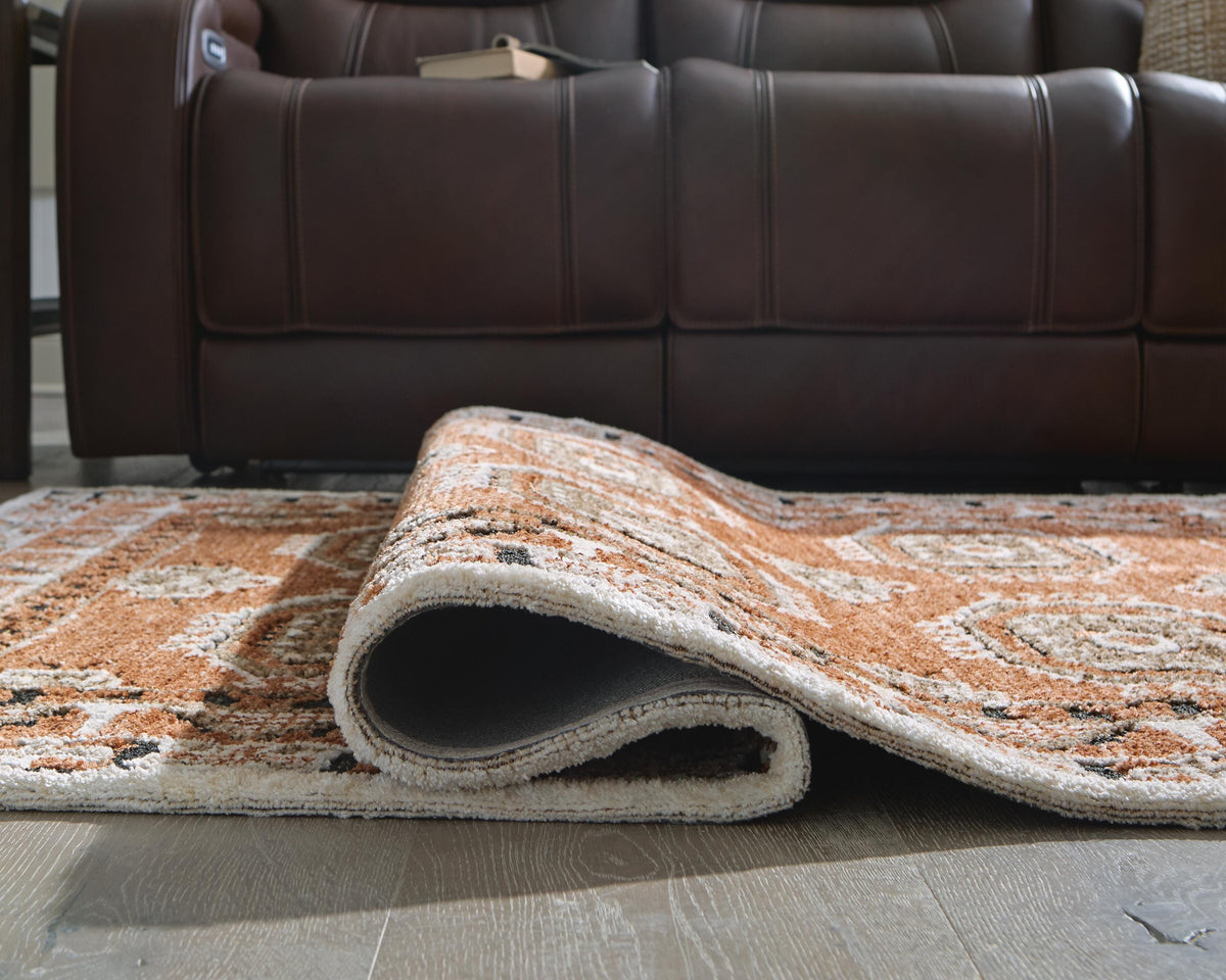 Qaabiz 5' x 7' Area Rug in Sienna/Ivory/Black, detail view