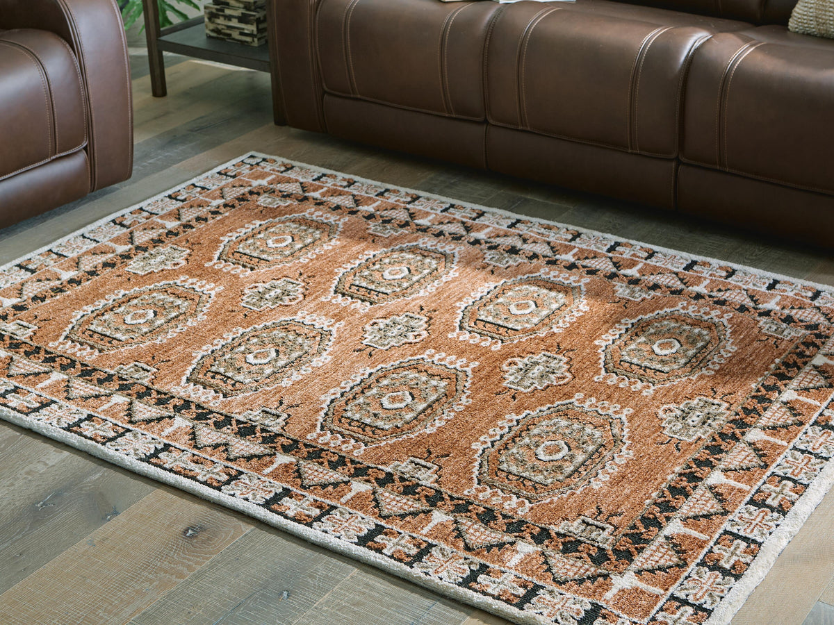 Qaabiz 5' x 7' Area Rug in Sienna/Ivory/Black, lifestyle view
