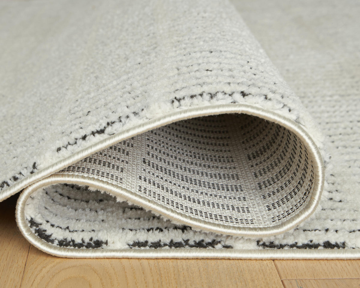 Turinwith 5'3" x 7' Area Rug in Ivory/Black, detail view