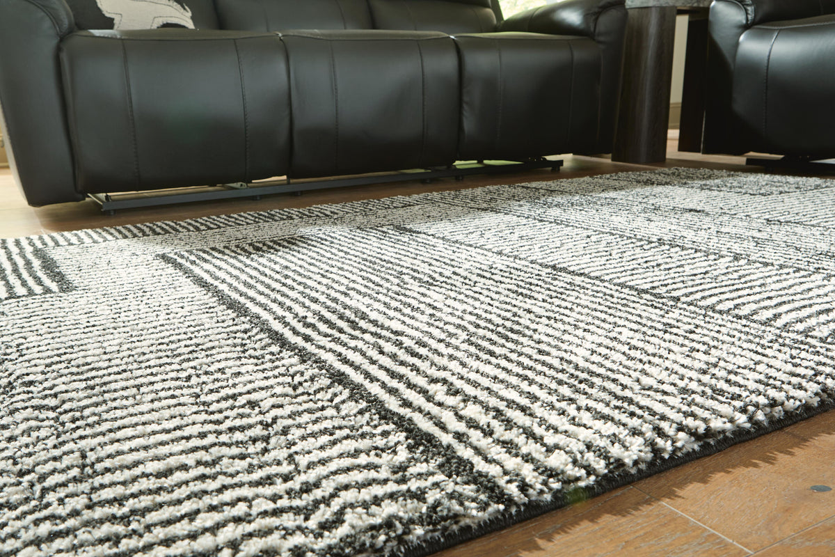 Kurtmen 5' x 7' Area Rug in Black/Ivory, detail view