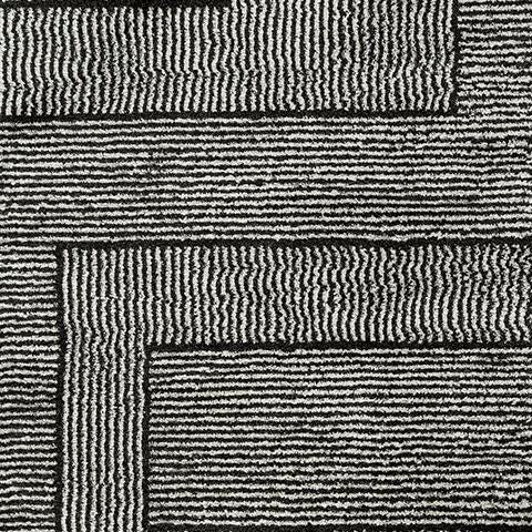 Kurtmen 5' x 7' Area Rug in Black/Ivory, fabric swatch