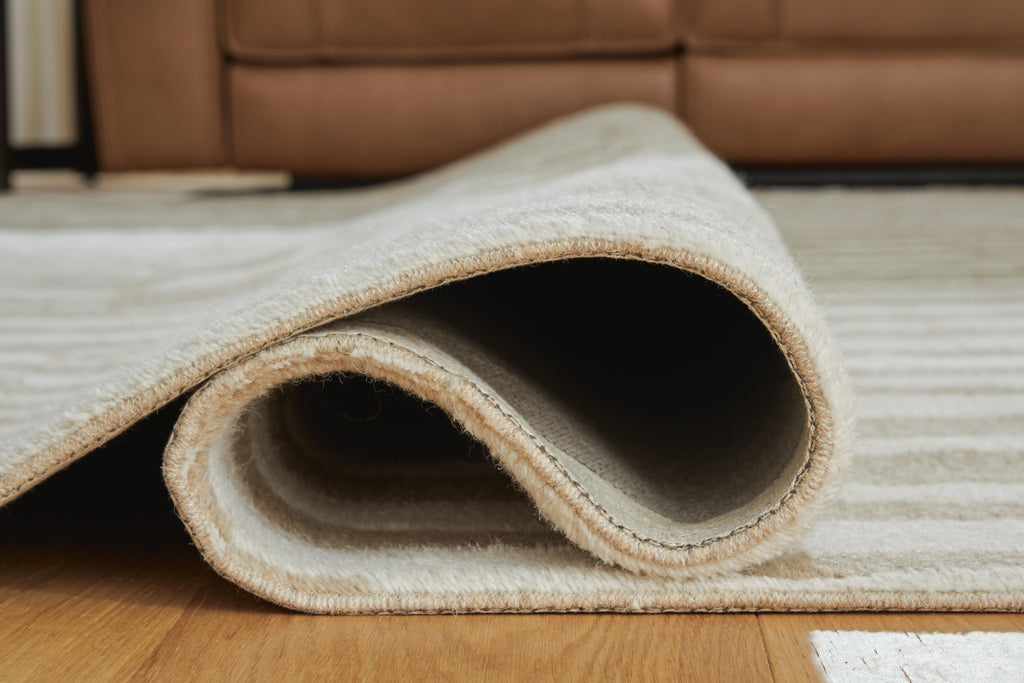 Corrbell 5' x 7' Area Rug in Beige/White, detail view