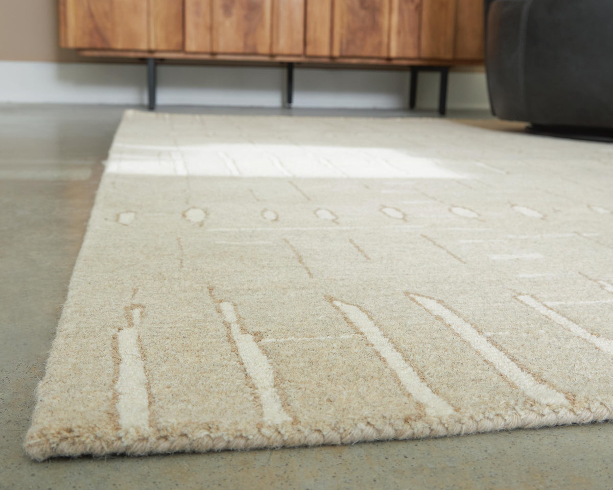 Wolbert 5' x 7' Area Rug in Tan/Ivory, detail view