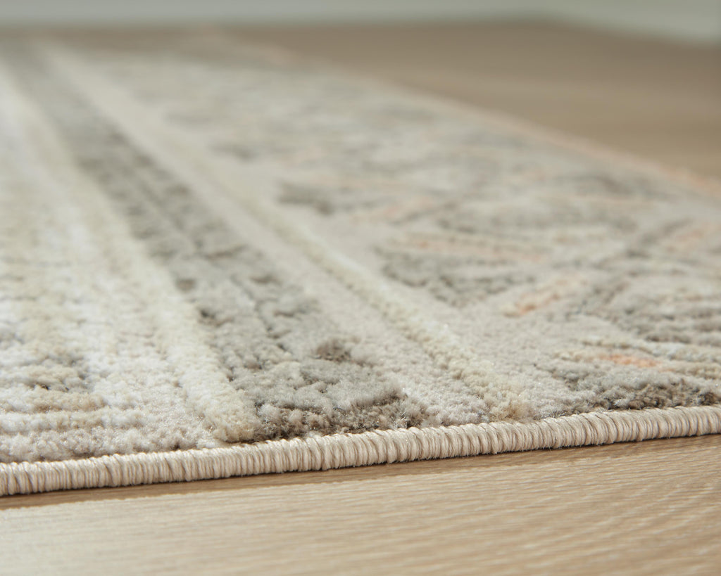 Bachby 5'3" x 7' Area Rug in Multi, detail view