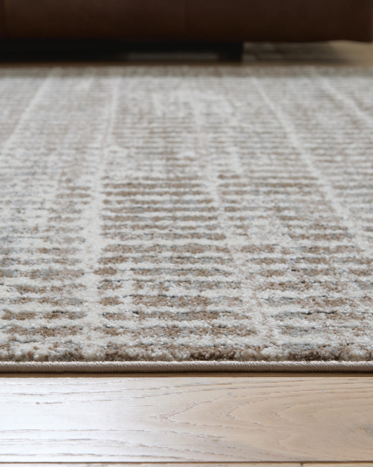 Fuadwick 5'3" x 7' Area Rug in Multi, detail view
