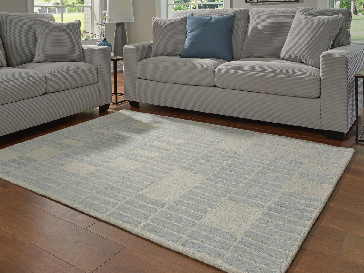 Dylanton 5' x 7' Area Rug in Ivory/Blue, lifestyle view