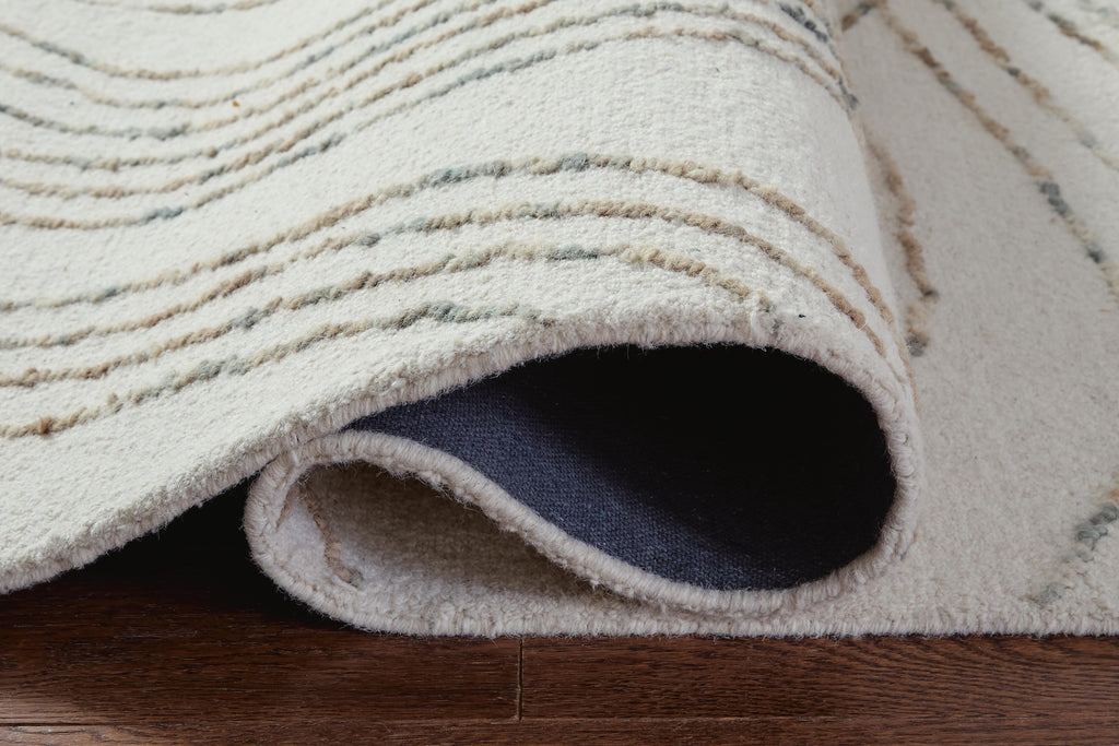 Deenbury 5' x 7' Area Rug in Ivory/Green/Brown, detail view