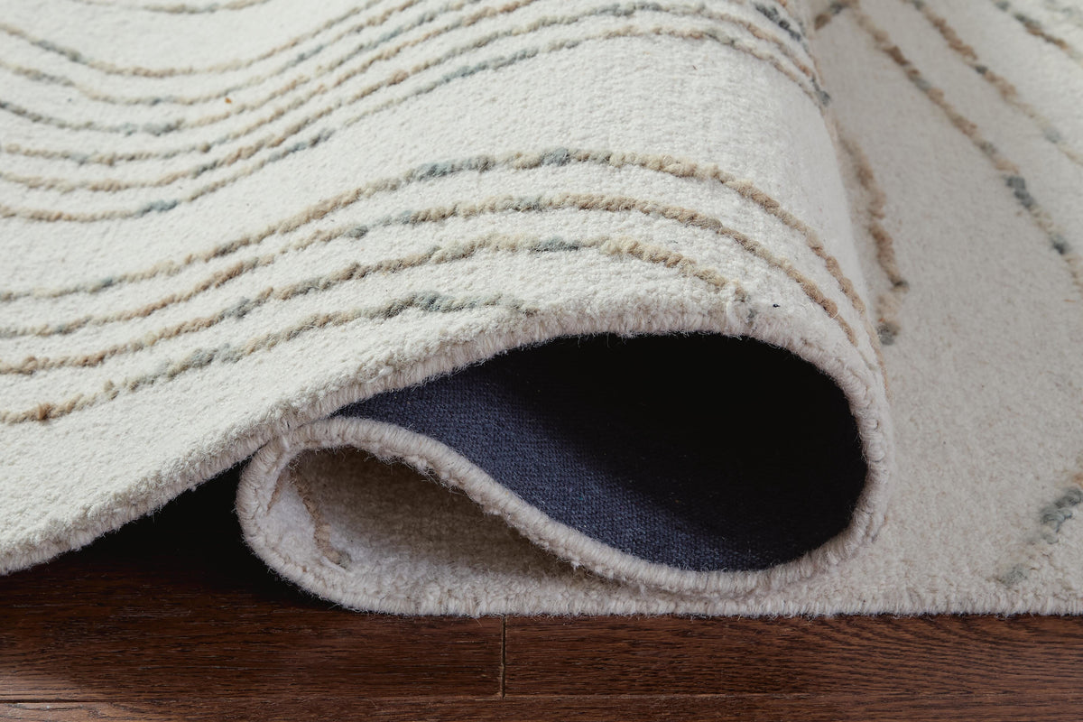 Deenbury 5' x 7' Area Rug in Ivory/Green/Brown, detail view