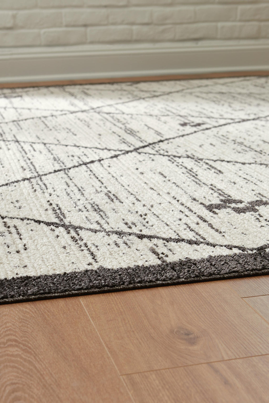 Fenriston Medium Rug in Cream/Black, detail view
