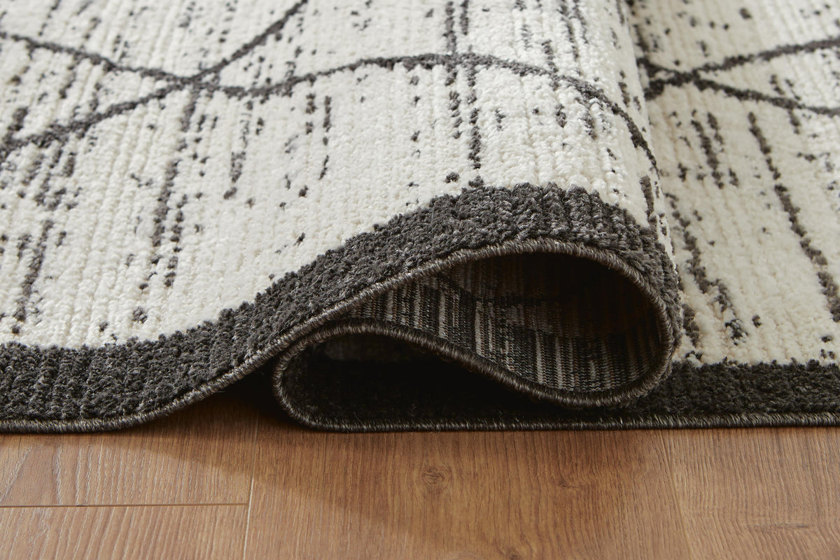 Fenriston Medium Rug in Cream/Black, detail view