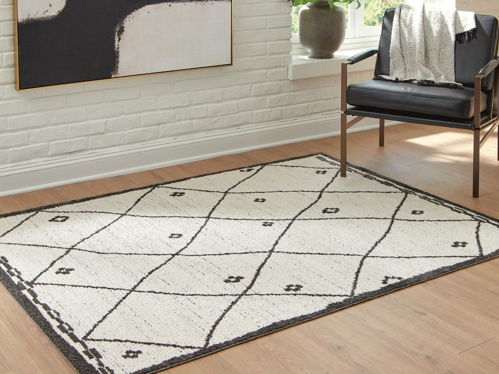 Fenriston Medium Rug in Cream/Black, lifestyle view