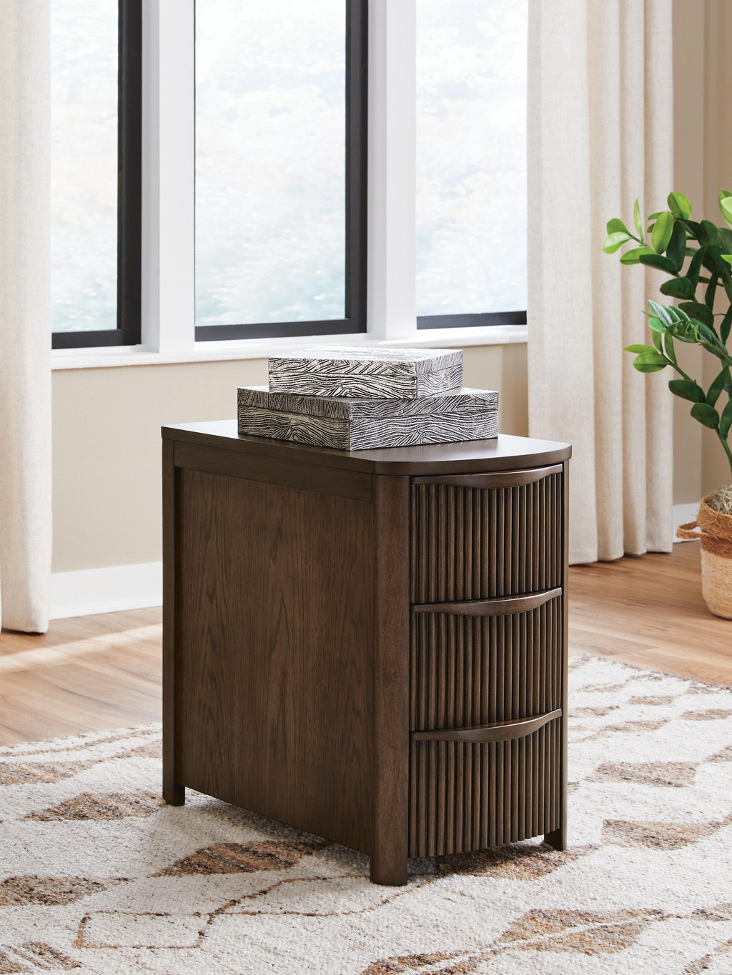 Camdill Chairside End Table in Dark Brown, lifestyle view