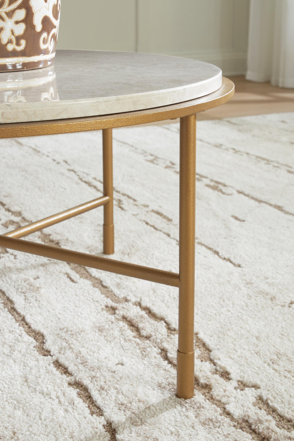 Alben Coffee Table in Antique Gold, detail view