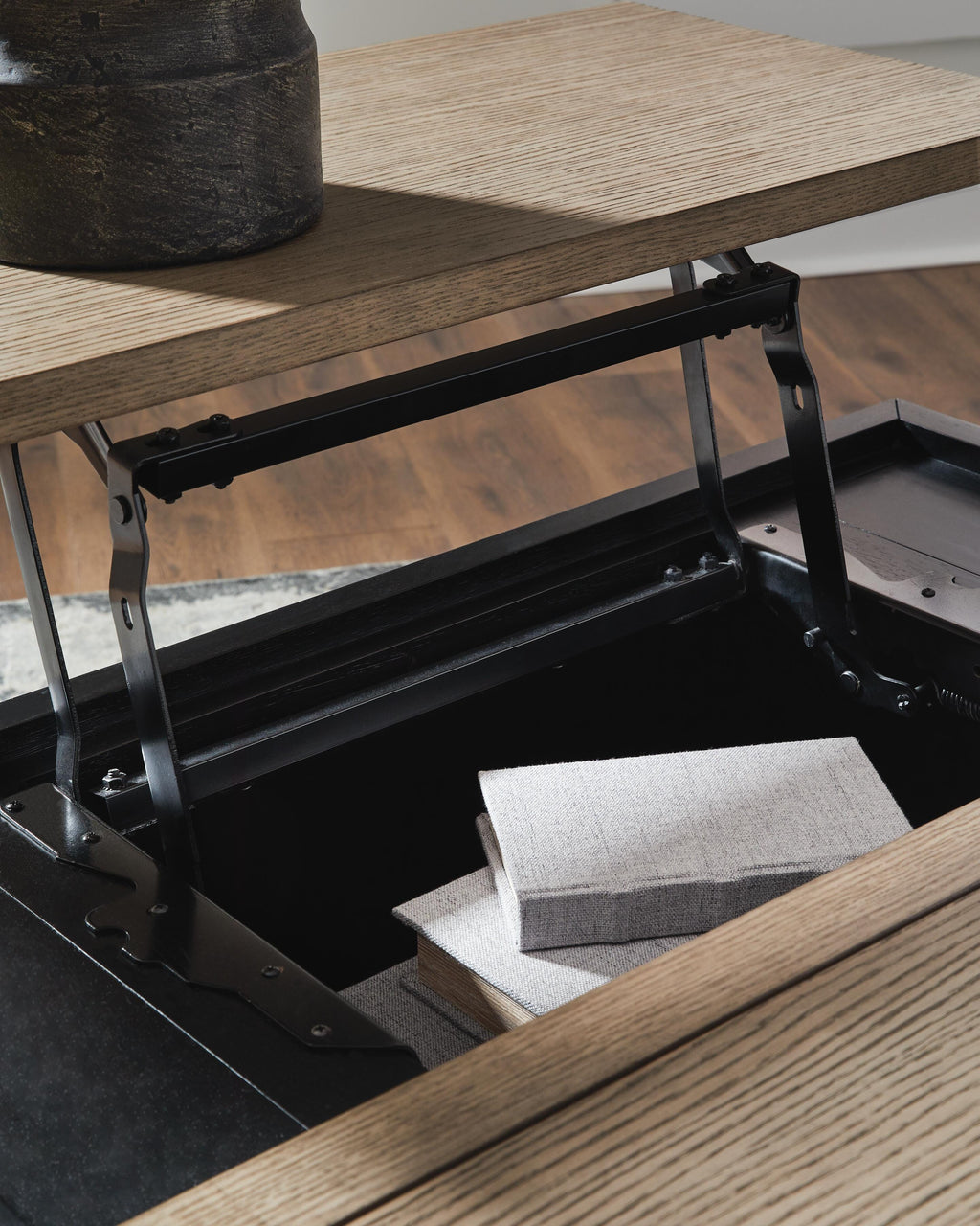 Rylandyn Lift-Top Coffee Table in Black/Light Brown, detail view