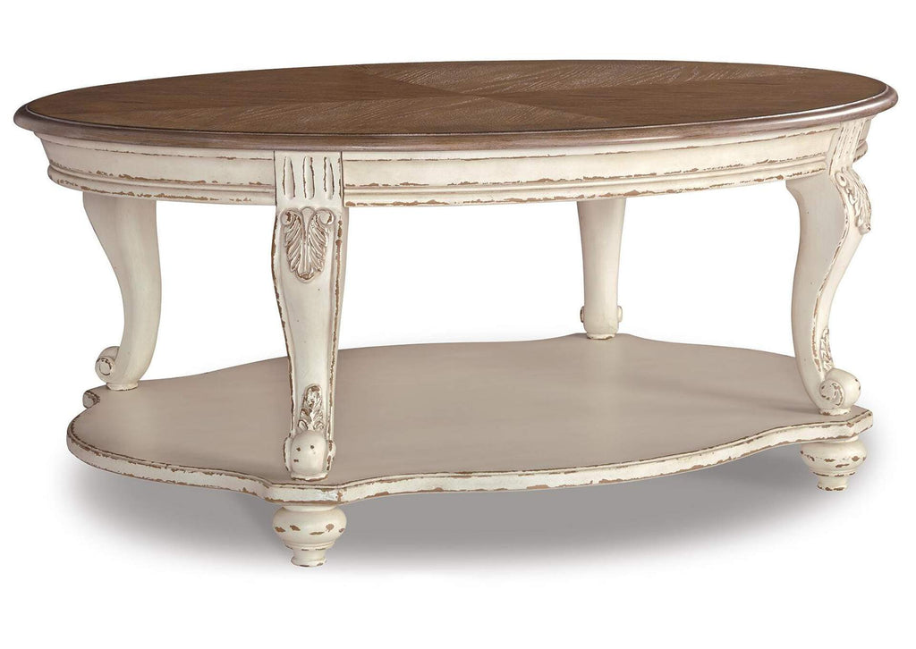 Realyn Coffee Table with 2 End Tables angled view