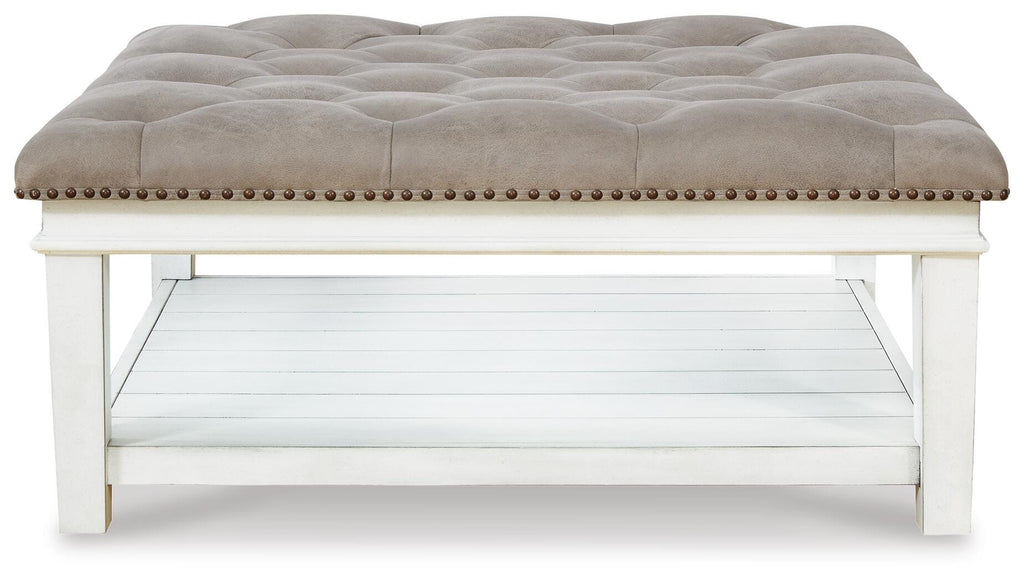 Kanwyn Upholstered Ottoman Coffee Table in Grayish Brown/White, side view
